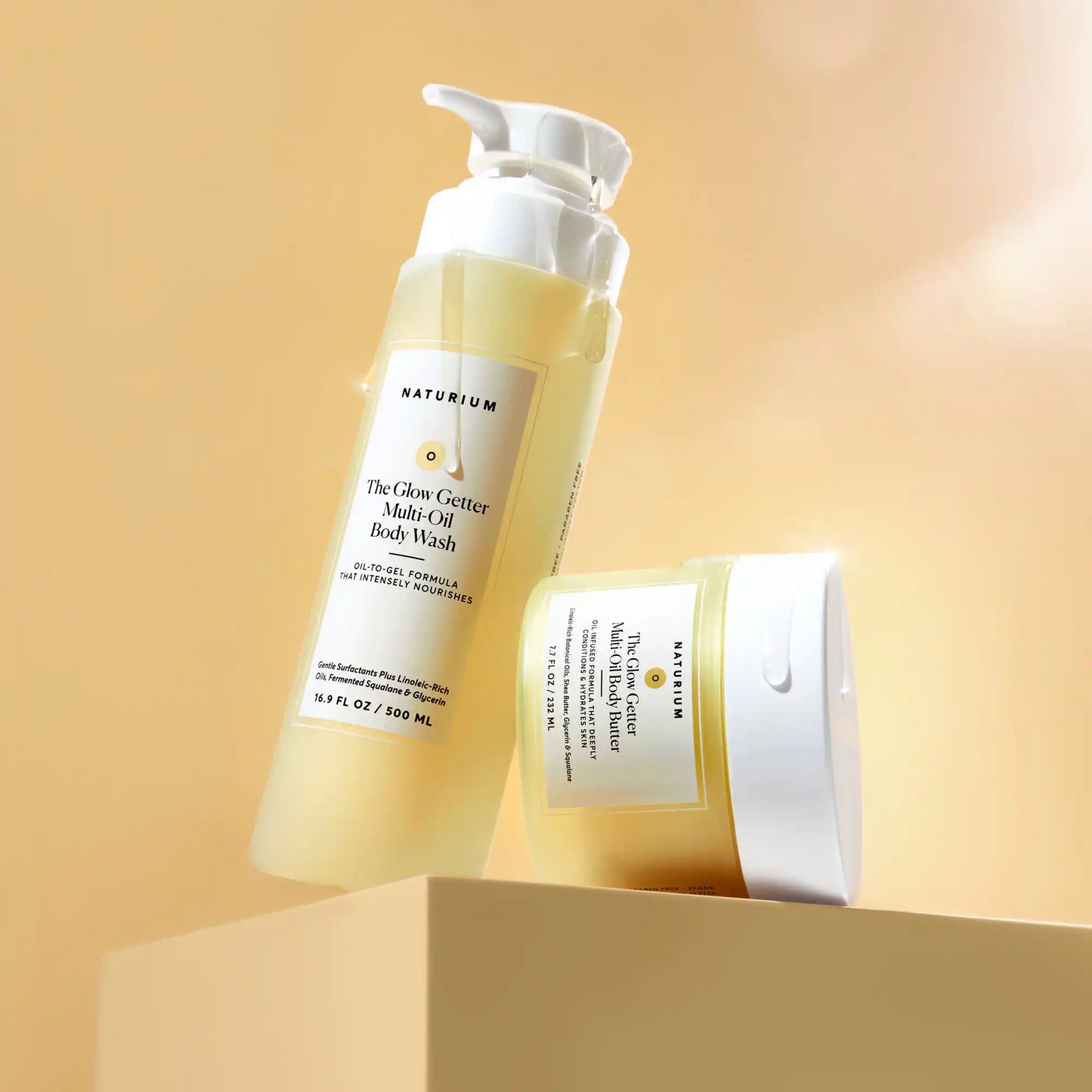 the-glow-all-out-body-bundle-i1 gg-bodybutter_1464-crop_revcolor_FL.webp
